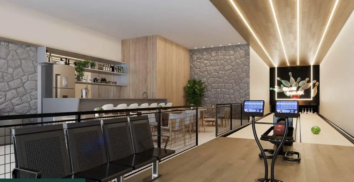 Sports bar com pista de boliche no clube do Oasis Laguna